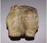 19th Century A celadon and russet jade carving of an elephant